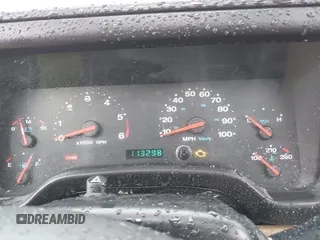 2000 Jeep Wrangler SE with VIN 1J4FA29P7YP793068, listed as a IAAI auction lot 41576287 with 113,298 mi miles. Bid and sale history available at carsss.com. Image 7.