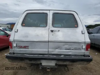 1990 GMC Suburban z VIN 1GKGR26N7LF537148, wystawiony jako Copart lot #45388815 z przebiegiem 265 951 mil mil oraz Tytuł czysty. Historia ofert i sprzedaży dostępna na DreamBid. Obrazek 6.