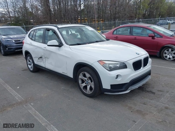 2015 BMW X1 sDrive28i with VIN WBAVM1C50FV314957, listed as a IAAI auction lot 41816402 with 148,410 mi miles. Bid and sale history available at carsss.com. Image 1.