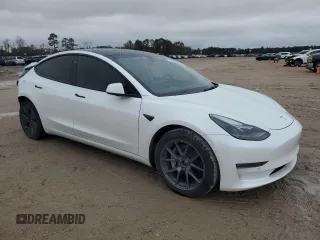 2022 Tesla Model 3 Long Range with VIN 5YJ3E1EB2NF201275, listed as a Copart auction lot 88024985 with 43,540 mi miles and Salvage Title. Bid and sale history available at DreamBid. Image 4.