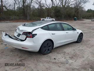2023 Tesla Model 3 Long Range with VIN 5YJ3E1EB9PF393622, listed as a IAAI auction lot 41207132 with 14,097 mi miles and . Bid and sale history available at DreamBid. Image 4.