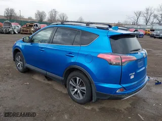 2017 Toyota RAV4 XLE with VIN JTMRFREV8HJ117393, listed as a IAAI auction lot 41676036 with 176,027 mi miles. Bid and sale history available at carsss.com. Image 3.
