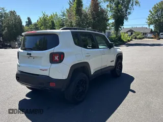 2017 Jeep Renegade Trailhawk with VIN ZACCJBCB6HPE79727, listed as a Copart auction lot 64074965 with 90,651 mi miles and Salvage title. Bid and sale history available at DreamBid. Image 4.