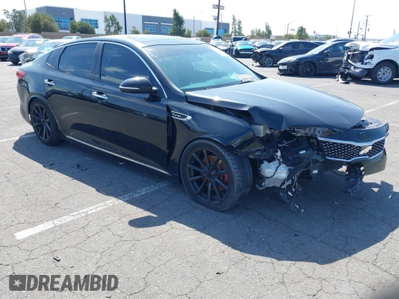 2016 Kia Optima SXL Turbo with VIN 5XXGV4L20GG042682, listed as a IAAI auction lot 41456456 with 117,542 mi miles. Bid and sale history available at carsss.com. Image 1.