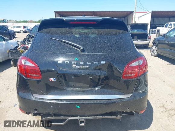2014 Porsche Cayenne Turbo S E-Hybrid z VIN WP1AA2A24ELA07504, wystawiony jako IAAI lot #41967592 z przebiegiem 114 308 mil mil oraz . Historia ofert i sprzedaży dostępna na DreamBid. Obrazek 16.