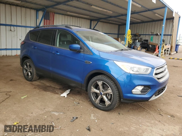 2017 Ford Escape SE with VIN 1FMCU9GD1HUC40205, listed as a Copart auction lot 54778475 with 54,297 mi miles and Clean Title. Bid and sale history available at carsss.com. Image 4.