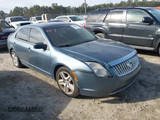 2011 Mercury Milan with VIN 3MEHM0HA2BR601822, listed as a IAAI auction lot 41282889 with 214,389 mi miles. Bid and sale history available at carsss.com. Image 1.