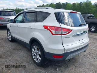 2015 Ford Escape Titanium with VIN 1FMCU0J91FUB13810, listed as a IAAI auction lot 41961798 with 139,265 mi miles. Bid and sale history available at carsss.com. Image 3.