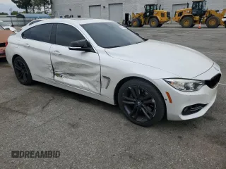 2015 BMW 4 Series 428i xDrive with VIN WBA4C9C59FD331372, listed as a Copart auction lot 58628665 with 81,245 mi miles and Salvage title. Bid and sale history available at DreamBid. Image 4.