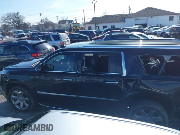 2018 Cadillac Escalade ESV Premium Luxury z VIN 1GYS4JKJ4JR396272, wystawiony jako IAAI lot #41662967 z przebiegiem 67 865 mil mil oraz . Historia ofert i sprzedaży dostępna na DreamBid. Obrazek 14.