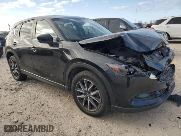 2018 Mazda CX-5 Touring with VIN JM3KFBCM0J0337911, listed as a Copart auction lot 46081615 with 80,673 mi miles and Salvage Title. Bid and sale history available at DreamBid. Image 4.