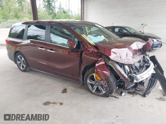 2019 Honda Odyssey Touring z VIN 5FNRL6H88KB030847, wystawiony jako IAAI lot #42433312 z przebiegiem Nie podano mil oraz . Historia ofert i sprzedaży dostępna na DreamBid. Obrazek 1.