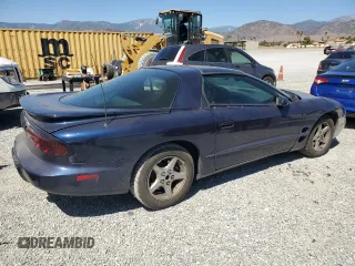 2000 Pontiac Firebird Firebird z VIN 2G2FS22K1Y2160613, wystawiony jako Copart lot #68363214 z przebiegiem 211 139 mil mil oraz Tytuł czysty. Historia ofert i sprzedaży dostępna na DreamBid. Obrazek 3.
