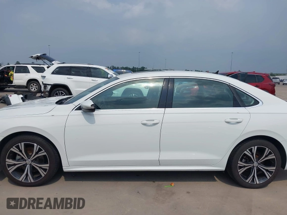 2021 Volkswagen Passat SE z VIN 1VWSA7A32MC014376, wystawiony jako IAAI lot #42314372 z przebiegiem 81 209 mil mil oraz . Historia ofert i sprzedaży dostępna na DreamBid. Obrazek 14.