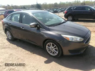 2015 Ford Focus SE with VIN 1FADP3F28FL292520, listed as a IAAI auction lot 41906723 with 74,106 mi miles. Bid and sale history available at carsss.com. Image 1.
