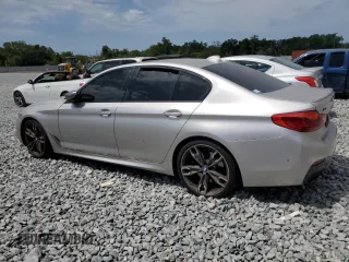 2019 BMW 5 Series M550i xDrive with VIN WBAJB9C53KB464902, listed as a Copart auction lot 54252875 with 45,157 mi miles and Salvage title. Bid and sale history available at DreamBid. Image 2.