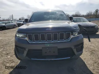 2025 Jeep Grand Cherokee Laredo with VIN 1C4RJHAG0SC268997, listed as a Copart auction lot 45860945 with 1,036 mi miles and Salvage Title. Bid and sale history available at DreamBid. Image 5.