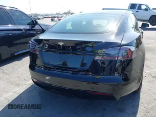 2022 Tesla Model S with VIN 5YJSA1E5XNF467435, listed as a IAAI auction lot 42538706 with 26,504 mi miles and . Bid and sale history available at DreamBid. Image 16.