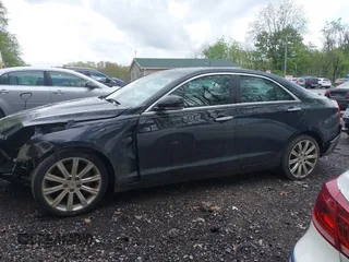 2013 Cadillac ATS Premium AWD z VIN 1G6AL5S36D0111869, wystawiony jako IAAI lot #42199637 z przebiegiem 148 404 mil mil oraz . Historia ofert i sprzedaży dostępna na DreamBid. Obrazek 15.