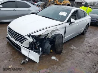 2023 Hyundai Sonata Hybrid Limited with VIN KMHL54JJ3PA065907, listed as a IAAI auction lot 41491036 with 49,943 mi miles. Bid and sale history available at carsss.com. Image 2.