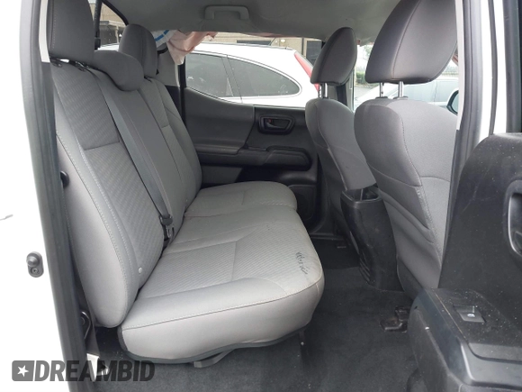 2021 Toyota Tacoma SR z VIN 3TMCZ5AN5MM417384, wystawiony jako IAAI lot #41617168 z przebiegiem 55 969 mil mil oraz . Historia ofert i sprzedaży dostępna na DreamBid. Obrazek 8.