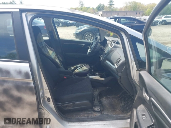 2015 Honda Fit LX with VIN 3HGGK5G57FM745231, listed as a IAAI auction lot 42250402 with 237,911 mi miles and . Bid and sale history available at DreamBid. Image 5.