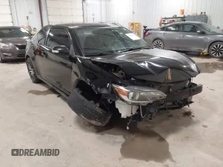 2015 Scion tC z VIN JTKJF5C77F3089252, wystawiony jako IAAI lot #41447952 z przebiegiem 122 451 mil mil oraz . Historia ofert i sprzedaży dostępna na DreamBid. Obrazek 1.