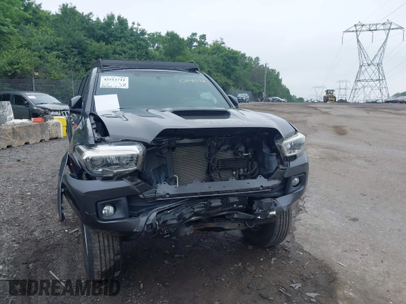 2017 Toyota Tacoma SR5 with VIN 3TMCZ5ANXHM089093, listed as a IAAI auction lot 42513711 with 86,022 mi miles and . Bid and sale history available at DreamBid. Image 6.