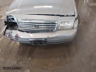 2005 Ford Crown Victoria LX with VIN 2FAFP74W95X158705, listed as a IAAI auction lot 41593553 with 276,940 mi miles. Bid and sale history available at carsss.com. Image 6.