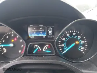 2015 Ford Escape Titanium with VIN 1FMCU9J98FUC90018, listed as a IAAI auction lot 41671941 with 102,335 mi miles. Bid and sale history available at carsss.com. Image 7.