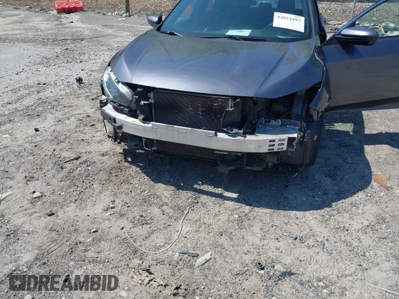 2019 Honda Civic Sport with VIN 2HGFC2F85KH576547, listed as a IAAI auction lot 42024497 with 86,468 mi miles and . Bid and sale history available at DreamBid. Image 6.