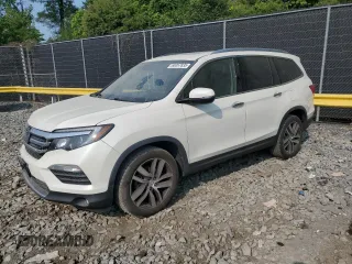 2017 Honda Pilot Elite with VIN 5FNYF6H04HB085169, listed as a Copart auction lot 60057835 with 175,834 mi miles and Salvage title. Bid and sale history available at DreamBid. Image 1.