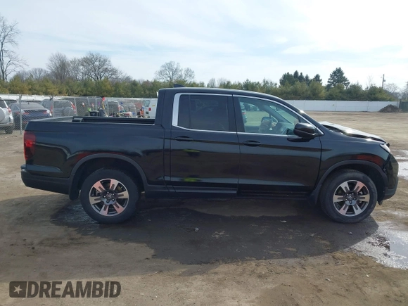 2017 Honda Ridgeline RTL z VIN 5FPYK3F59HB014002, wystawiony jako IAAI lot #41781159 z przebiegiem 110 393 mil mil oraz . Historia ofert i sprzedaży dostępna na DreamBid. Obrazek 14.
