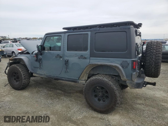 2015 Jeep Wrangler Unlimited Rubicon with VIN 1C4BJWFG7FL674201, listed as a Copart auction lot 49466455 with 0 mi miles and Salvage Title. Bid and sale history available at carsss.com. Image 2.