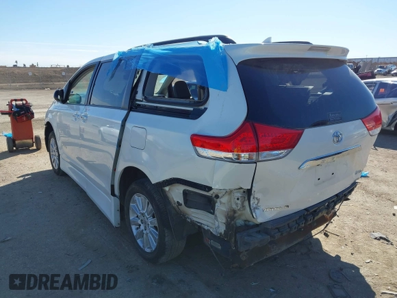 2011 Toyota Sienna XLE AAS with VIN 5TDYK3DCXBS126143, listed as a IAAI auction lot 41663238 with 154,238 mi miles. Bid and sale history available at carsss.com. Image 3.