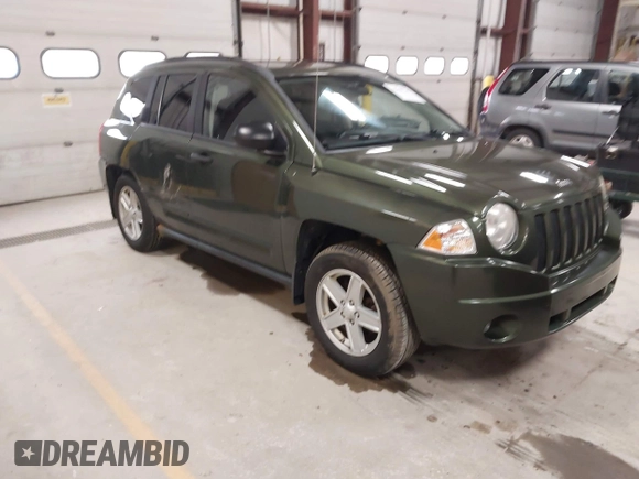 2008 Jeep Compass Sport with VIN 1J8FF47W28D534267, listed as a IAAI auction lot 42009243 with 122,720 mi miles and . Bid and sale history available at carsss.com. Image 1.