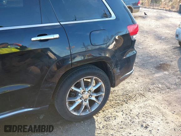 2014 Jeep Grand Cherokee Summit with VIN 1C4RJEJG1EC130727, listed as a IAAI auction lot 41269066 with 205,914 mi miles and . Bid and sale history available at DreamBid. Image 6.