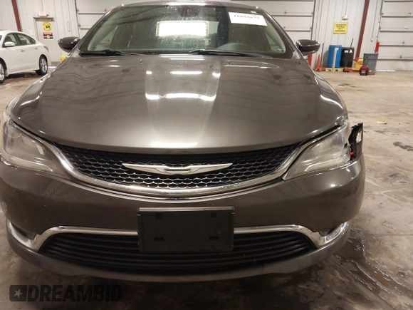 2015 Chrysler 200 Limited with VIN 1C3CCCAB0FN607876, listed as a IAAI auction lot 41882675 with 136,146 mi miles. Bid and sale history available at carsss.com. Image 6.