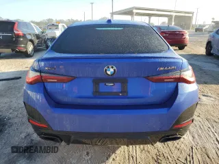 2022 BMW 4 Series M440i xDrive с VIN WBA13AW00NFL94612, выставлен на аукционе Copart как лот 76690314 с пробегом Не указан миль и Списание • Salvage title. История ставок и продаж доступна на DreamBid. Изображение 6.