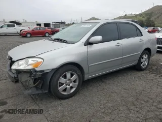 2004 Toyota Corolla CE with VIN 1NXBR32E34Z297414, listed as a Copart auction lot 52541105 with 147,072 mi miles and Salvage Title. Bid and sale history available at DreamBid. Image 1.