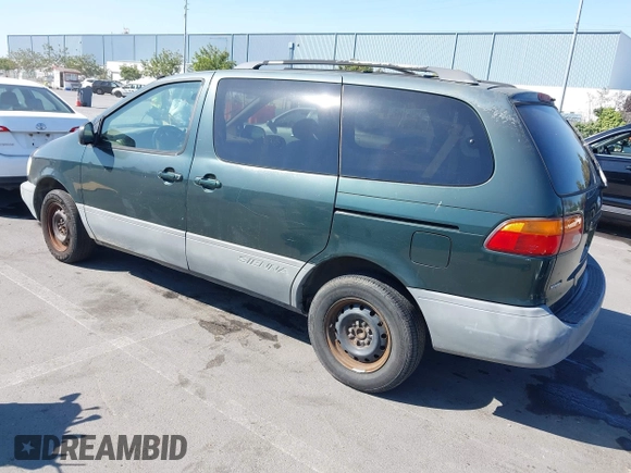 2000 Toyota Sienna LE with VIN 4T3ZF13CXYU312352, listed as a IAAI auction lot 42629403 with 166,361 mi miles and . Bid and sale history available at DreamBid. Image 3.
