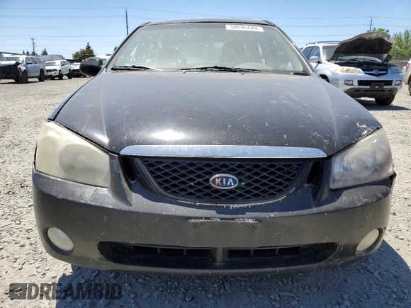 2005 Kia Spectra LX with VIN KNAFE121255156796, listed as a Copart auction lot 58595684 with 197,792 mi miles and Salvage Title. Bid and sale history available at carsss.com. Image 5.