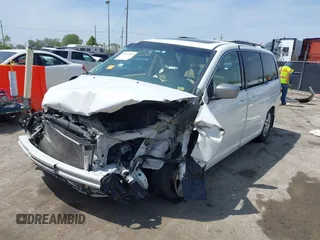 2007 Honda Odyssey EX-L with VIN 5FNRL38617B141003, listed as a IAAI auction lot 39232543 with 195,096 mi miles and . Bid and sale history available at DreamBid. Image 2.