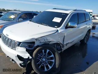 2017 Jeep Grand Cherokee Overland with VIN 1C4RJECGXHC636297, listed as a IAAI auction lot 41661922 with 111,477 mi miles. Bid and sale history available at carsss.com. Image 17.