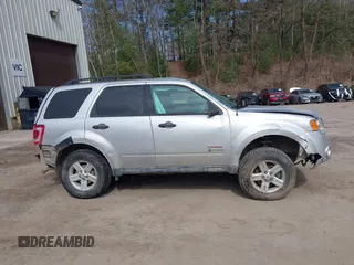 2010 Ford Escape Hybrid z VIN 1FMCU5K33AKC89835, wystawiony jako IAAI lot #41915349 z przebiegiem 125 659 mil mil oraz . Historia ofert i sprzedaży dostępna na DreamBid. Obrazek 13.