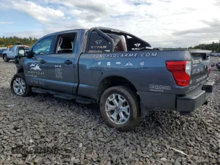 2024 Nissan Titan XD PRO-4X with VIN 1N6AA1FB9RN103589, listed as a Copart auction lot 74289014 with 19,332 mi miles and Salvage Title. Bid and sale history available at carsss.com. Image 2.