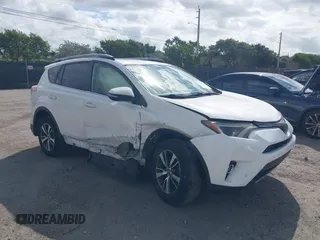 2018 Toyota RAV4 XLE with VIN JTMWFREV7JJ731893, listed as a IAAI auction lot 41567850 with 141,269 mi miles. Bid and sale history available at carsss.com. Image 1.