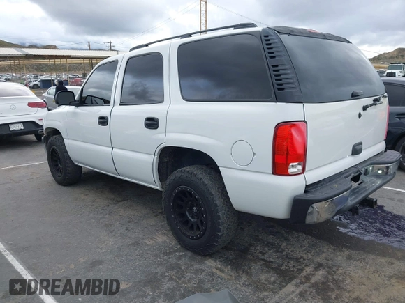 2005 Chevrolet Tahoe LS with VIN 1GNEC13V85J243672, listed as a IAAI auction lot 41801268 with 202,624 mi miles and . Bid and sale history available at DreamBid. Image 3.