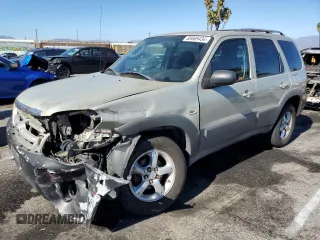 2005 Mazda Tribute i with VIN 4F2YZ02Z85KM31234, listed as a Copart auction lot 68669434 with 211,921 mi miles and Salvage Title. Bid and sale history available at carsss.com. Image 1.