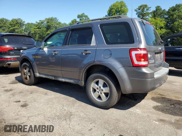 2009 Ford Escape XLS with VIN 1FMCU02749KA36136, listed as a Copart auction lot 64941875 with 171,576 mi miles and Clean title. Bid and sale history available at DreamBid. Image 2.